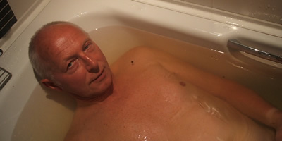 Ray Oddie in seaweed bath